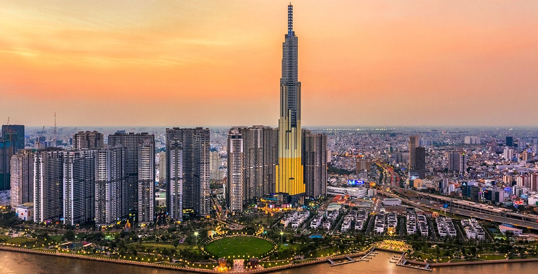 Aerial view of Landmark 81 in Ho Chi Minh City at sunset.