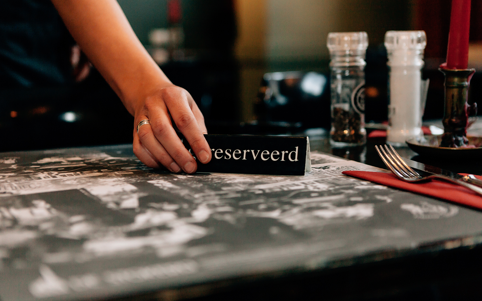 Reserved table set for dining at a Disneyland restaurant.