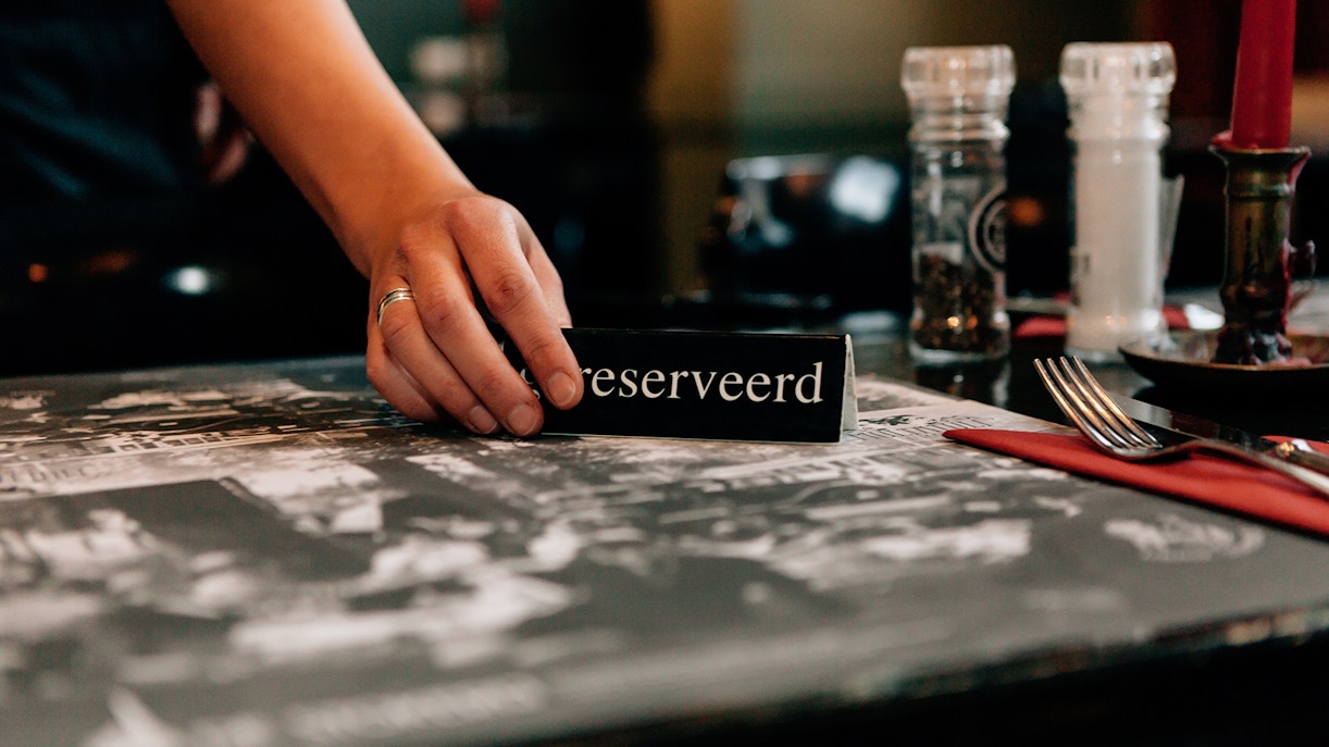 Reserved table set for dining at a Disneyland restaurant.