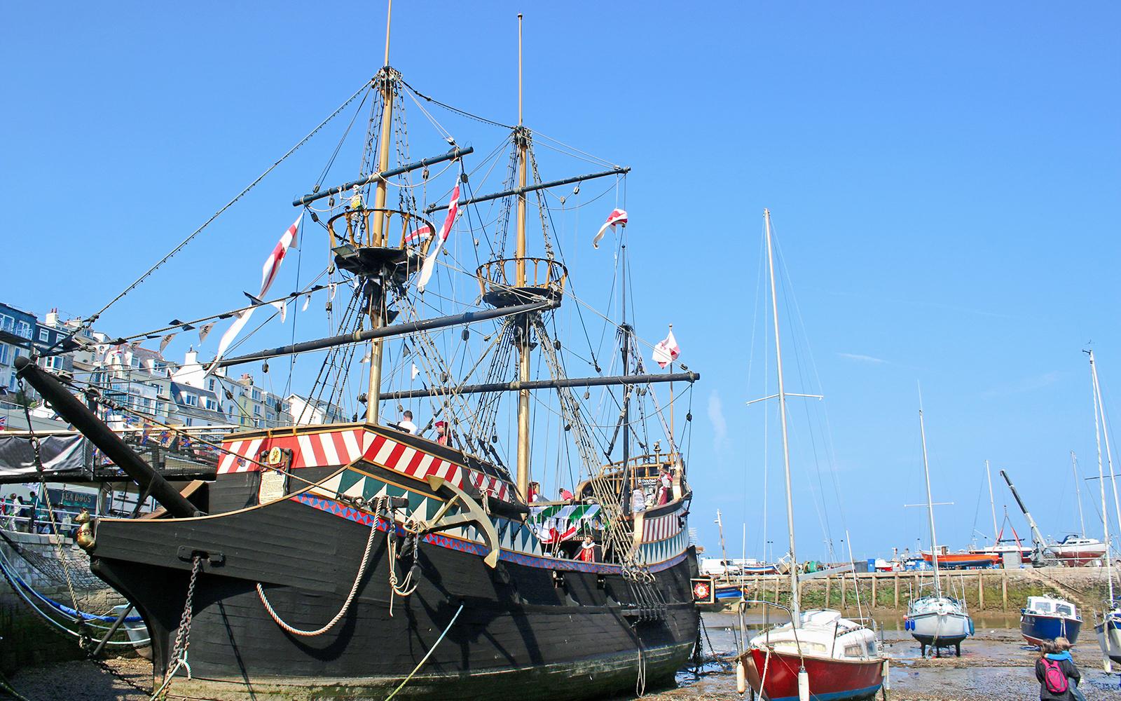 Golden Hind replica ship docked in Brixham harbor, England.