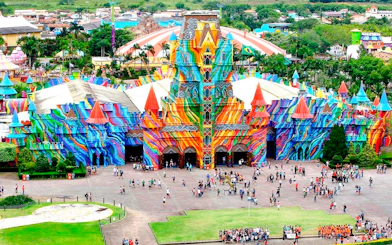 Colorful entrance of Beto Carrero World theme park with visitors, Santa Catarina, Brazil.