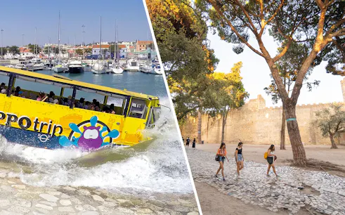 Bus entering water at Lisbon marina during sightseeing tour.
