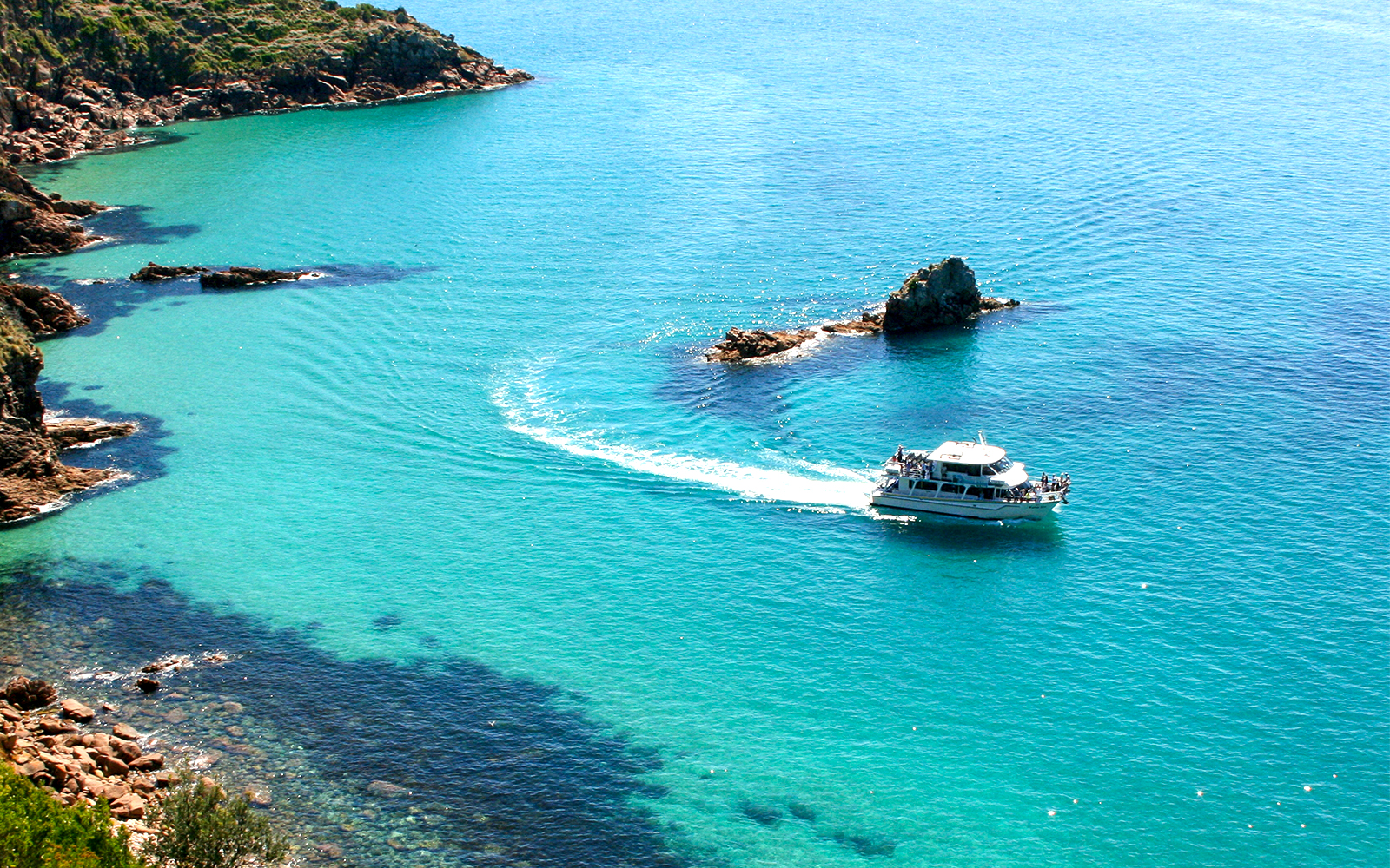 Cruise boat on Cape Woolamai coastline, Phillip Island.