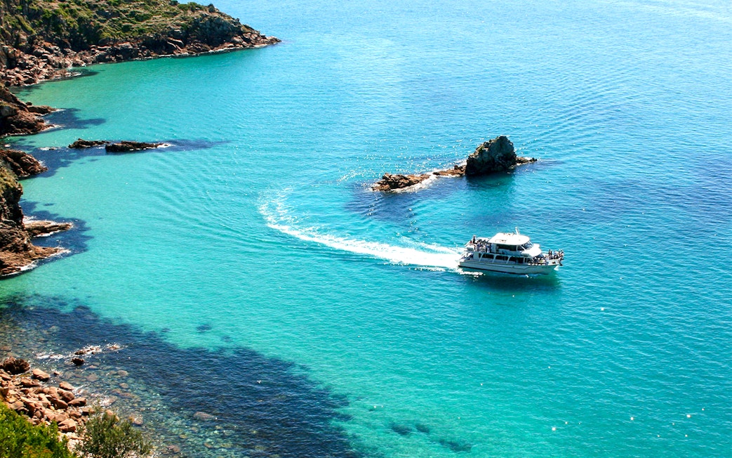 Cruise boat on Cape Woolamai coastline, Phillip Island.