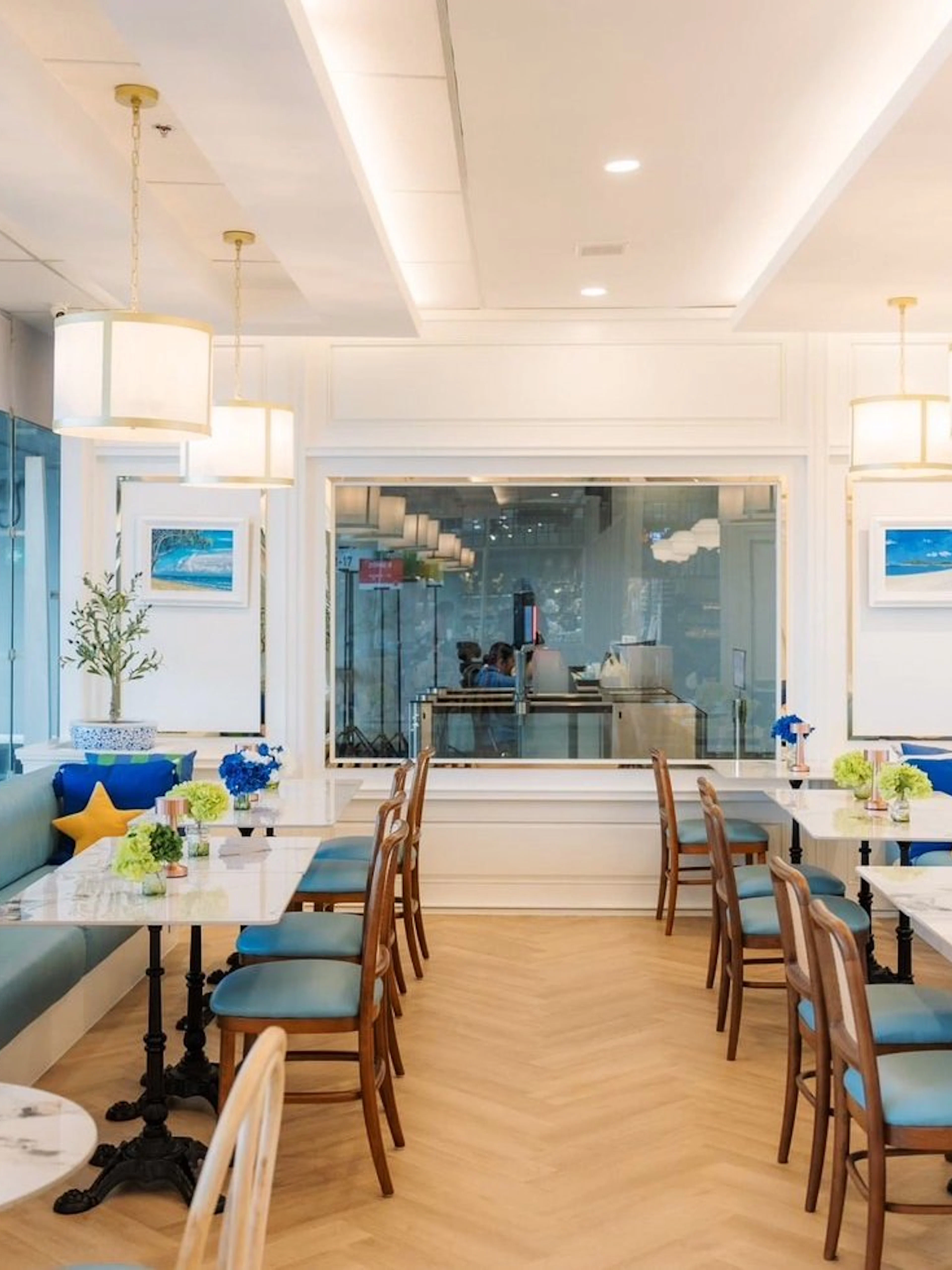 Coral International Lounge seating area with tables and decor at Phuket International Airport.