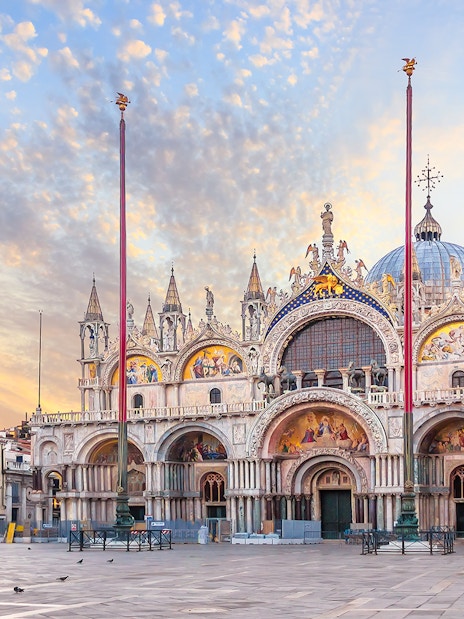 St. Mark's Basilica facade at sunrise in Venice, Italy.