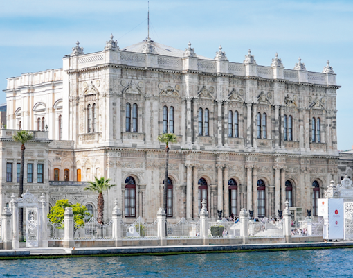 Dolmabahçe Palace view from Bosphorus during afternoon cruise in Istanbul.