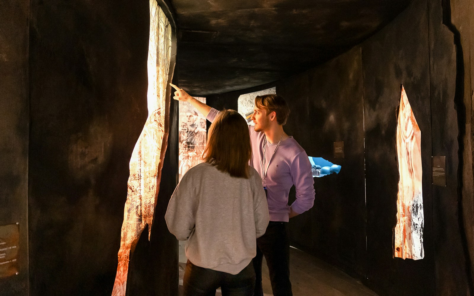Visitors exploring exhibit at Oskar Schindler’s Factory in Krakow.