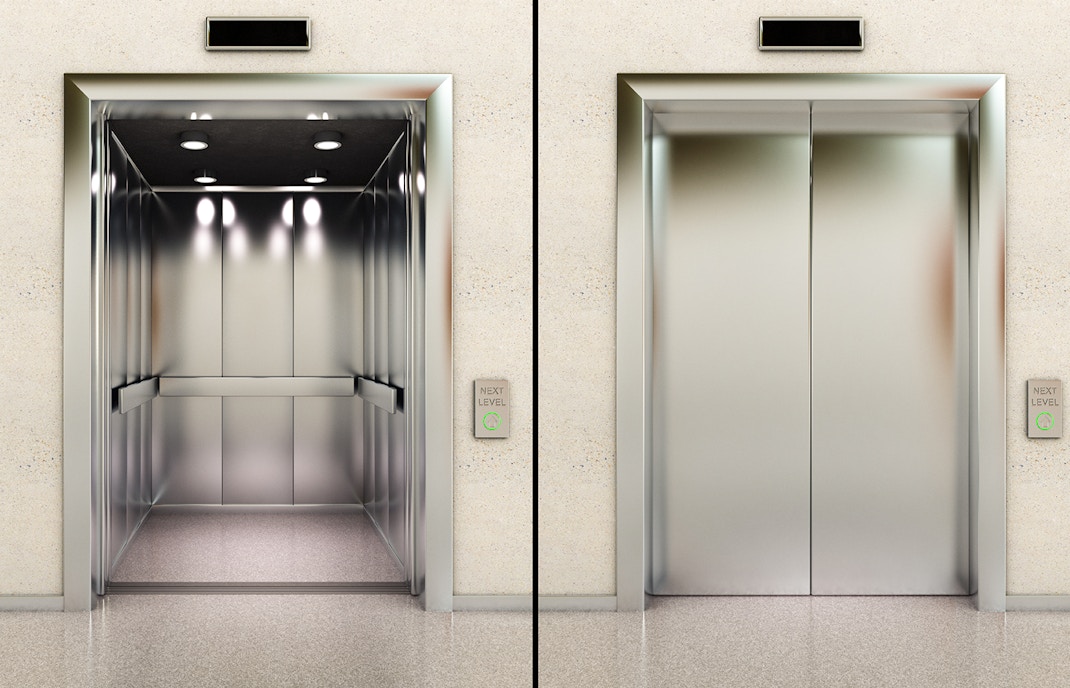Berlin TV Tower elevator interior and closed doors with next level button.