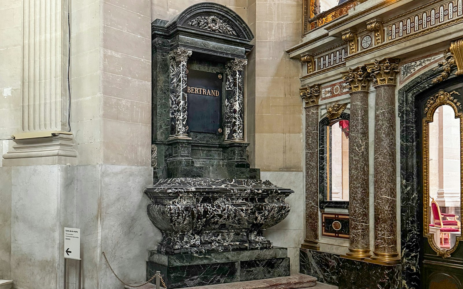 Napoleon's Tomb at Invalides, Paris Army Museum, with ornate sarcophagus and historical architecture.
