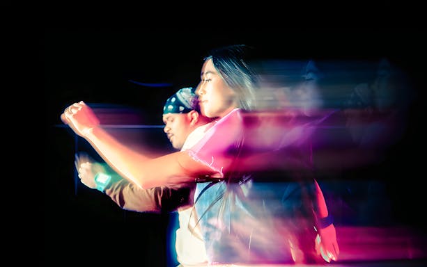 Participants in motion at Squid Games experience, London.