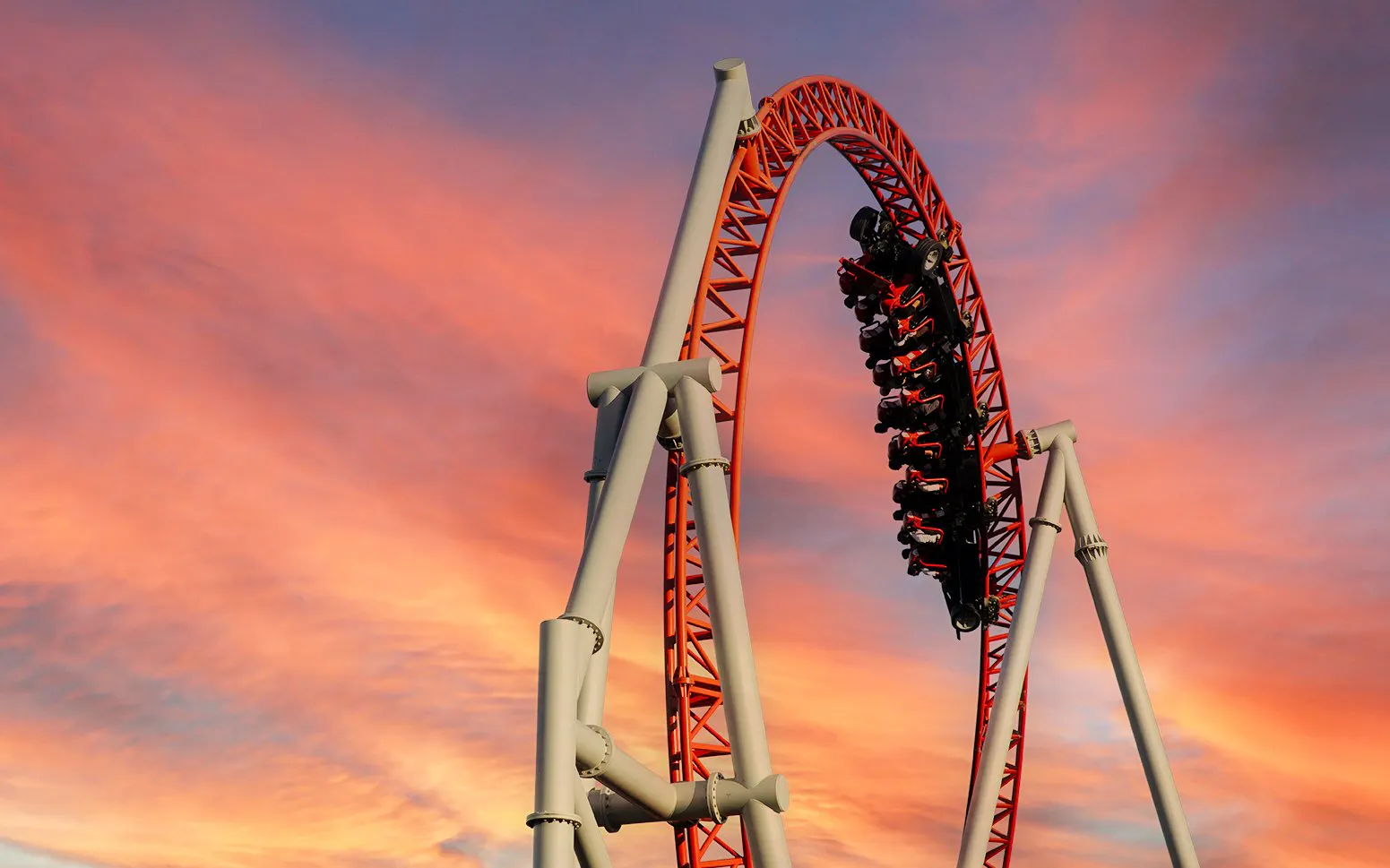 Roller coaster loop at sunset, Vialand Theme Park, Istanbul.