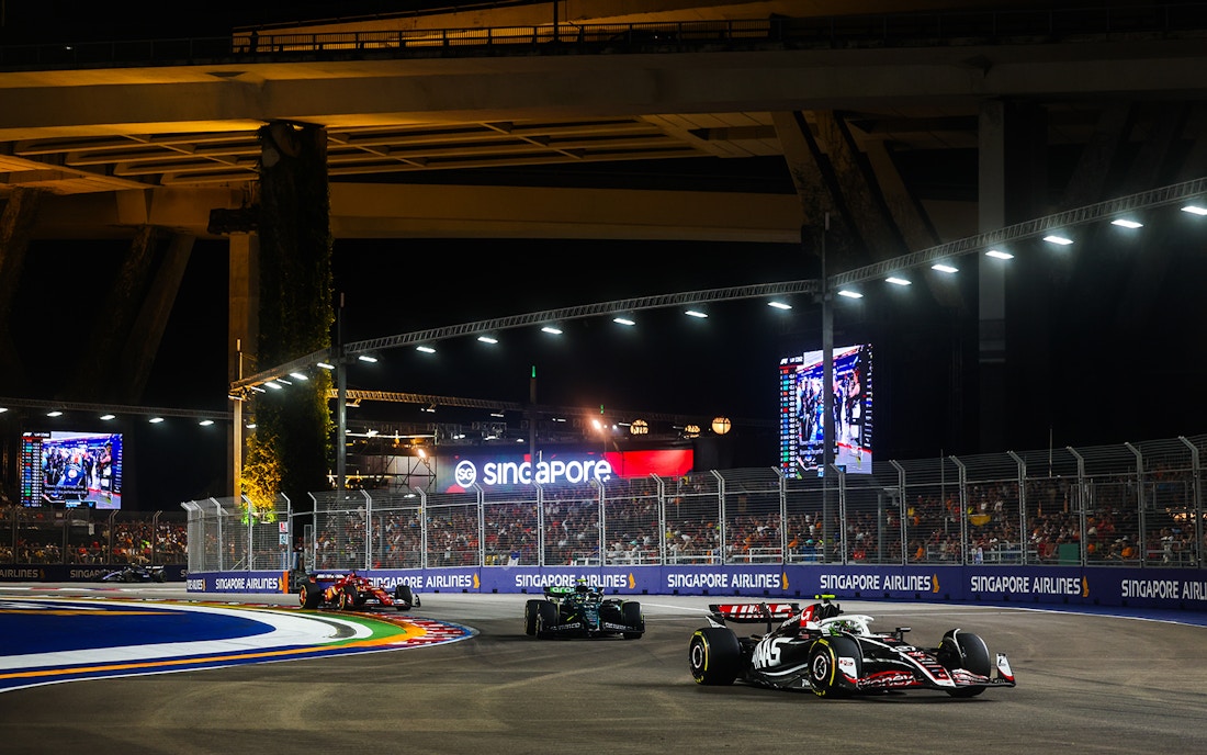 Haas' Nico Hulkenberg leads Aston Martin's Fernando Alonso, and Ferrari's Charles Leclerc at F1 Singapore
