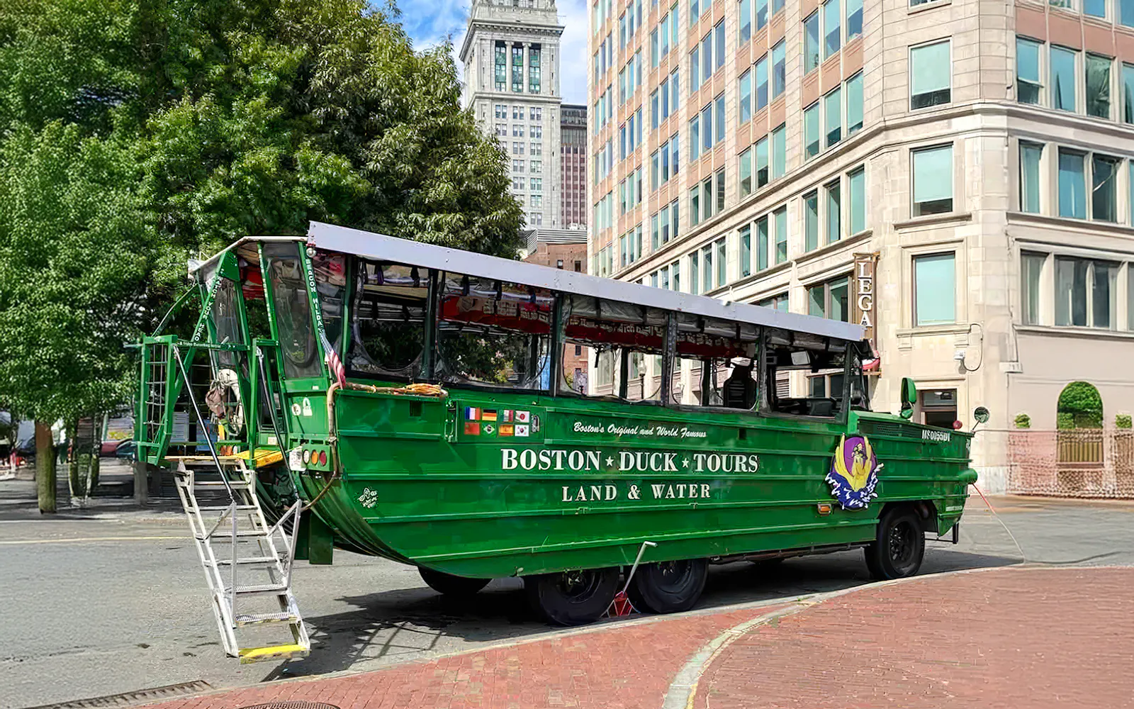 Boston Duck Tours amphibious vehicle parked near historic buildings.