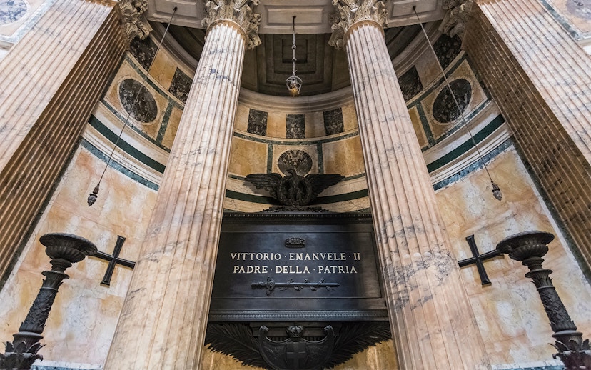 Tomb of King Victor Emmanuel II inside the Pantheon, Rome, with marble columns.