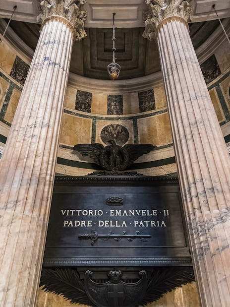 Tomb of King Victor Emmanuel II inside the Pantheon, Rome, with marble columns.