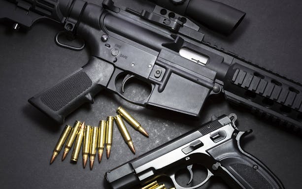 Rifles and bullets at an extreme shooting range experience with hotel transfer.