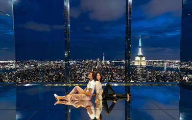 Night view from One Vanderbilt in NYC with Empire State Building, Combo Save 21% offer.