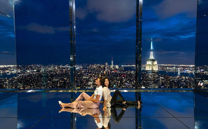 Night view from One Vanderbilt in NYC with Empire State Building, Combo Save 21% offer.