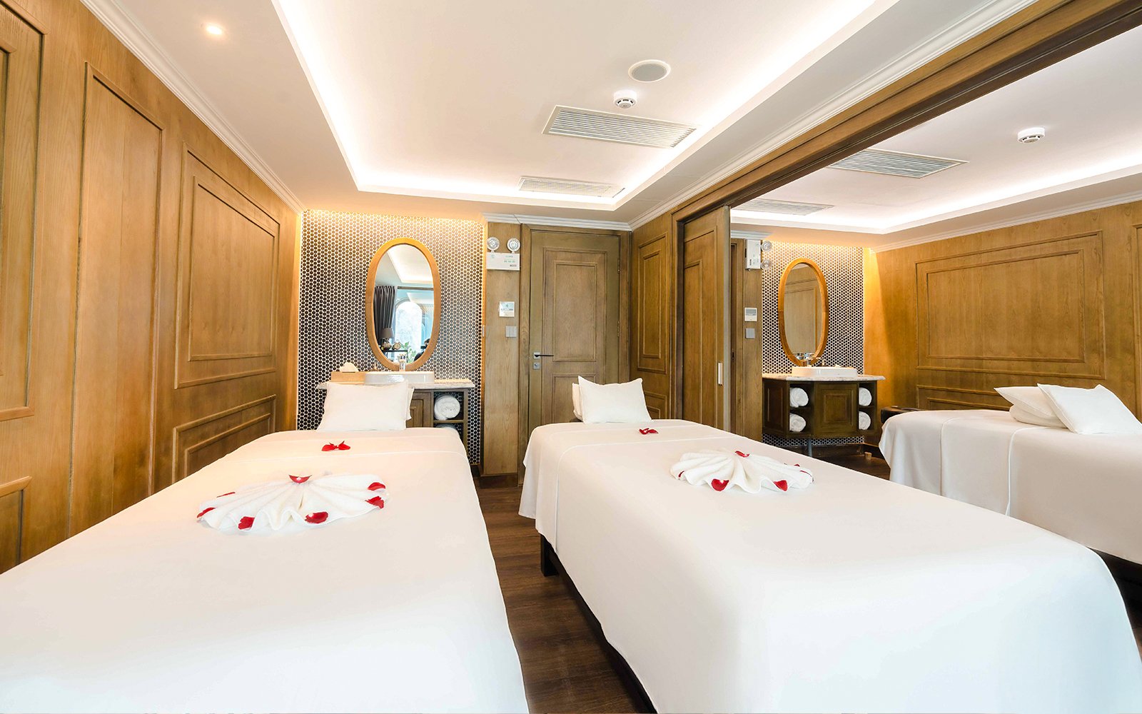 Spa treatment room with two massage tables on Ambassador cruise.