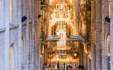 Main altar and central nave view from the choir of Santiago de Compostela Cathedral.