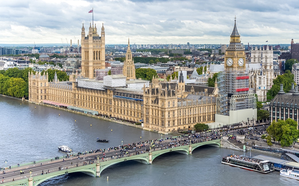 Aerial view of the Houses of Parliament and Big Ben in London, near the River Thames.