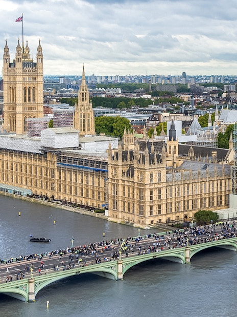 Aerial view of the Houses of Parliament and Big Ben in London, near the River Thames.