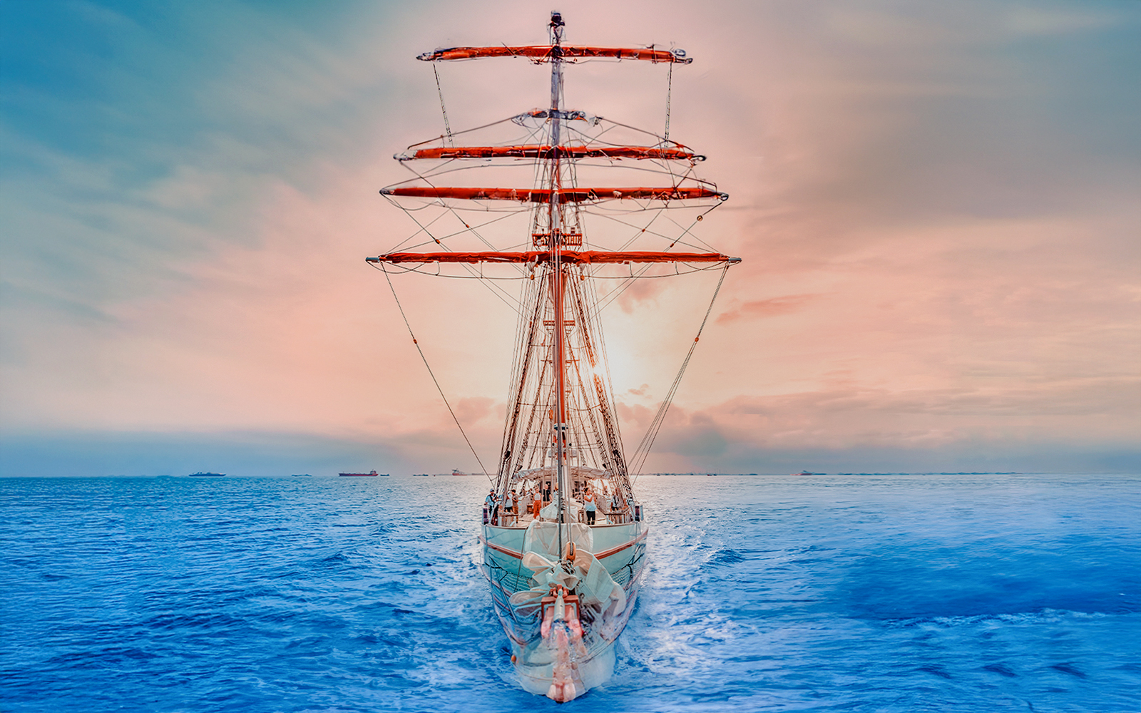 The Royal Albatross sailing at sunset on open sea.