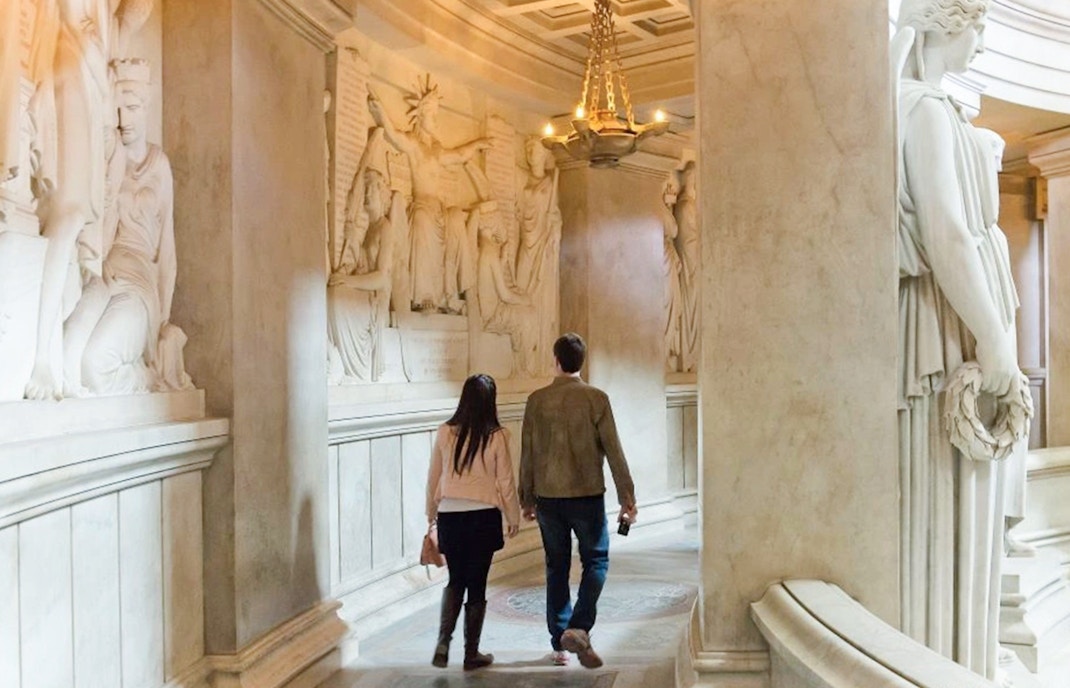 Couple exploring Invalides Napoleon's Tomb