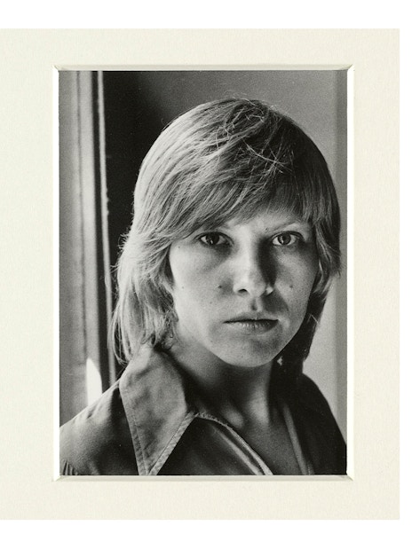 Black and white portraits of two individuals at the National Gallery of Victoria's Women Photographers exhibition.