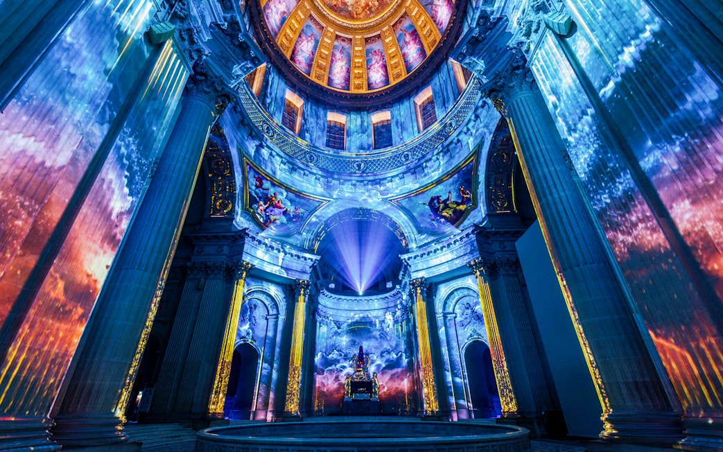 Immersive light projections inside Invalides dome, Paris, for Aura experience.