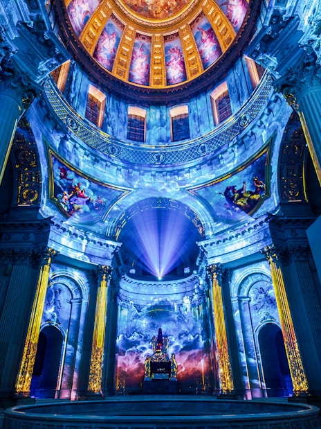 Immersive light projections inside Invalides dome, Paris, for Aura experience.