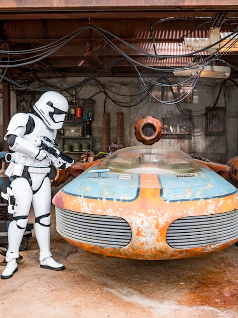 Stormtroopers with a speeder at Star Wars Galaxy's Edge, Disneyland Park, California.