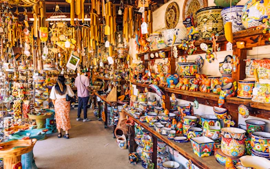 Colorful pottery and crafts in a Mexico City souvenir shop.