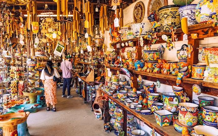 Colorful pottery and crafts in a Mexico City souvenir shop.