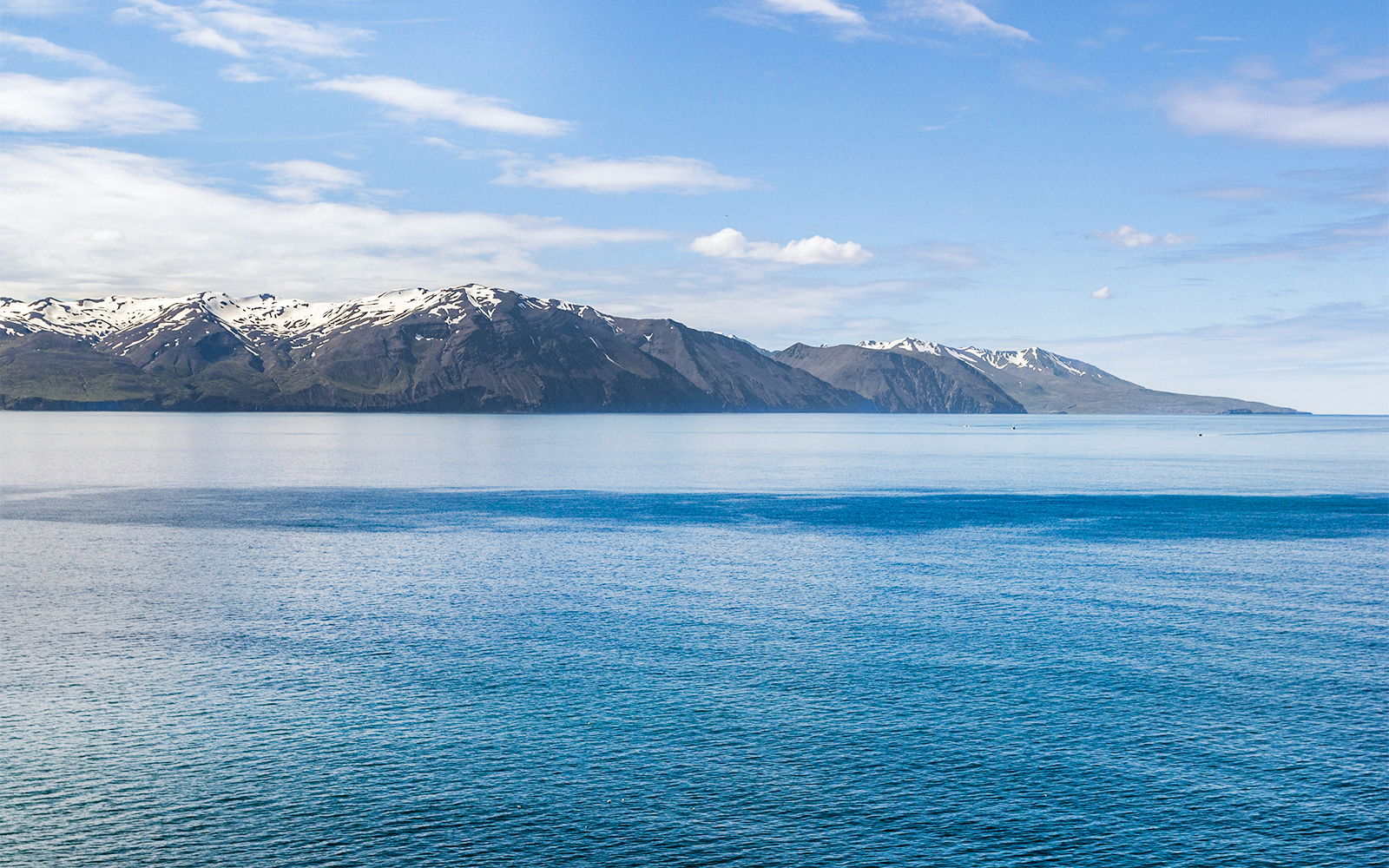 Panoramic view of Skjálfandi Bay from a cliff near Húsavík, Iceland.