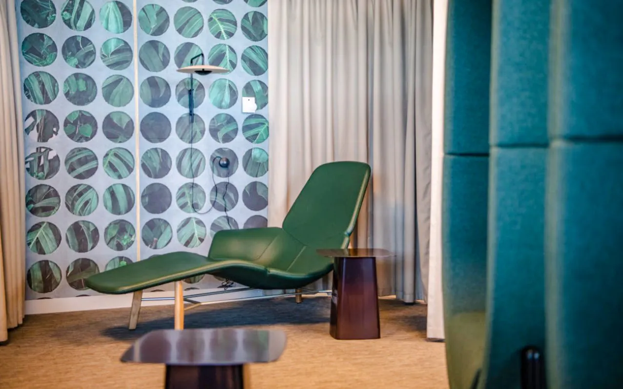 Lounge chair and table in Marhaba Lounge at Zurich Airport Airside Centre.