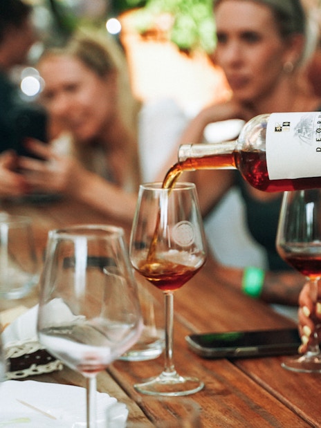 Wine being poured into a glass during Krka Waterfalls tour from Split.