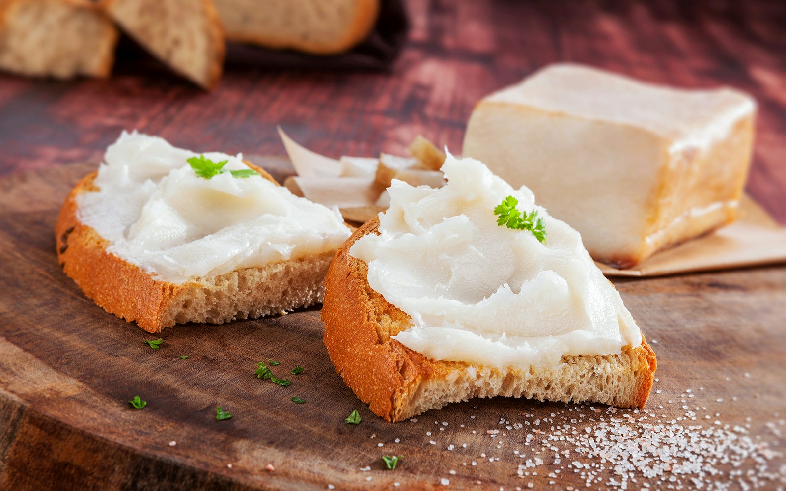 Homemade lard spread with bread on Medieval Dinner Prague menu.