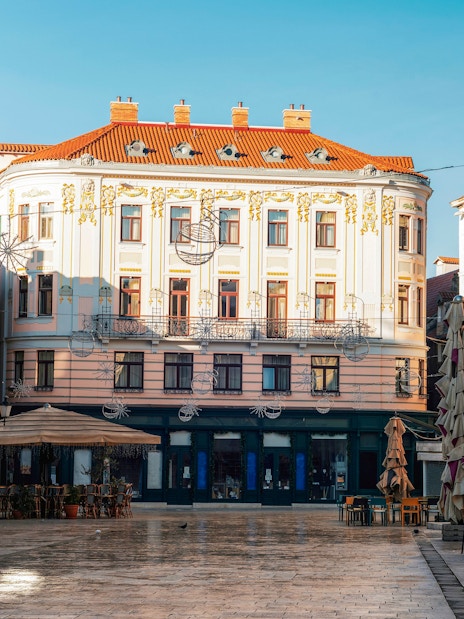Pjaca Square in Split, Croatia, featuring historic buildings and outdoor café seating.