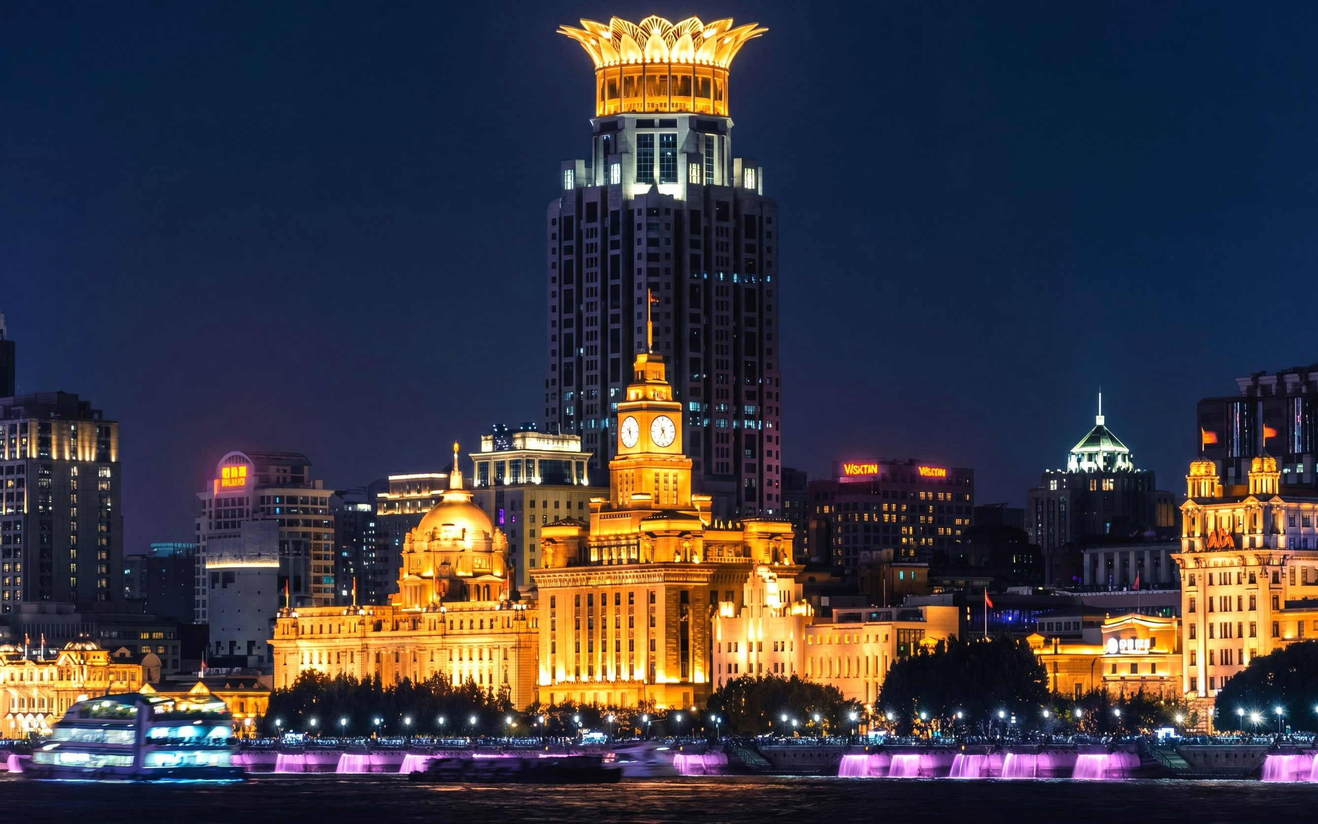 Night view of The Bund's historic European-style buildings along the Huangpu River in Shanghai, China.