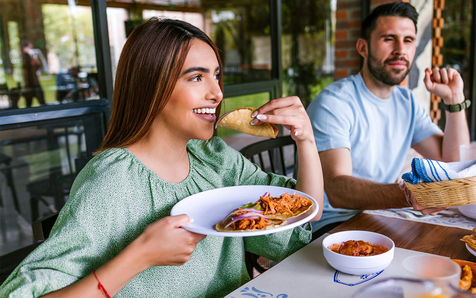 visitors enjoying their meal at restaurant