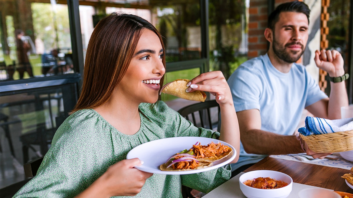 Dining at Restaurant with tacos and local cuisine.