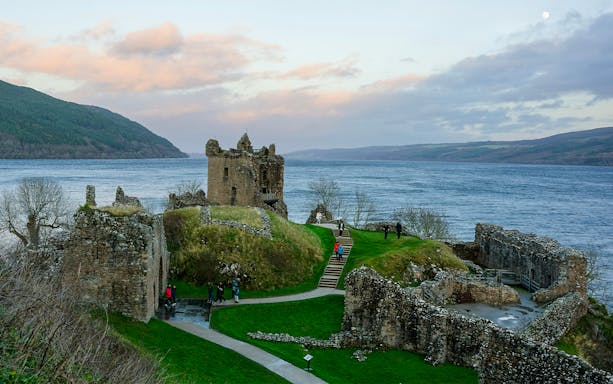 Ruins of Urquhart Castle overlooking Loch Ness in Scotland.