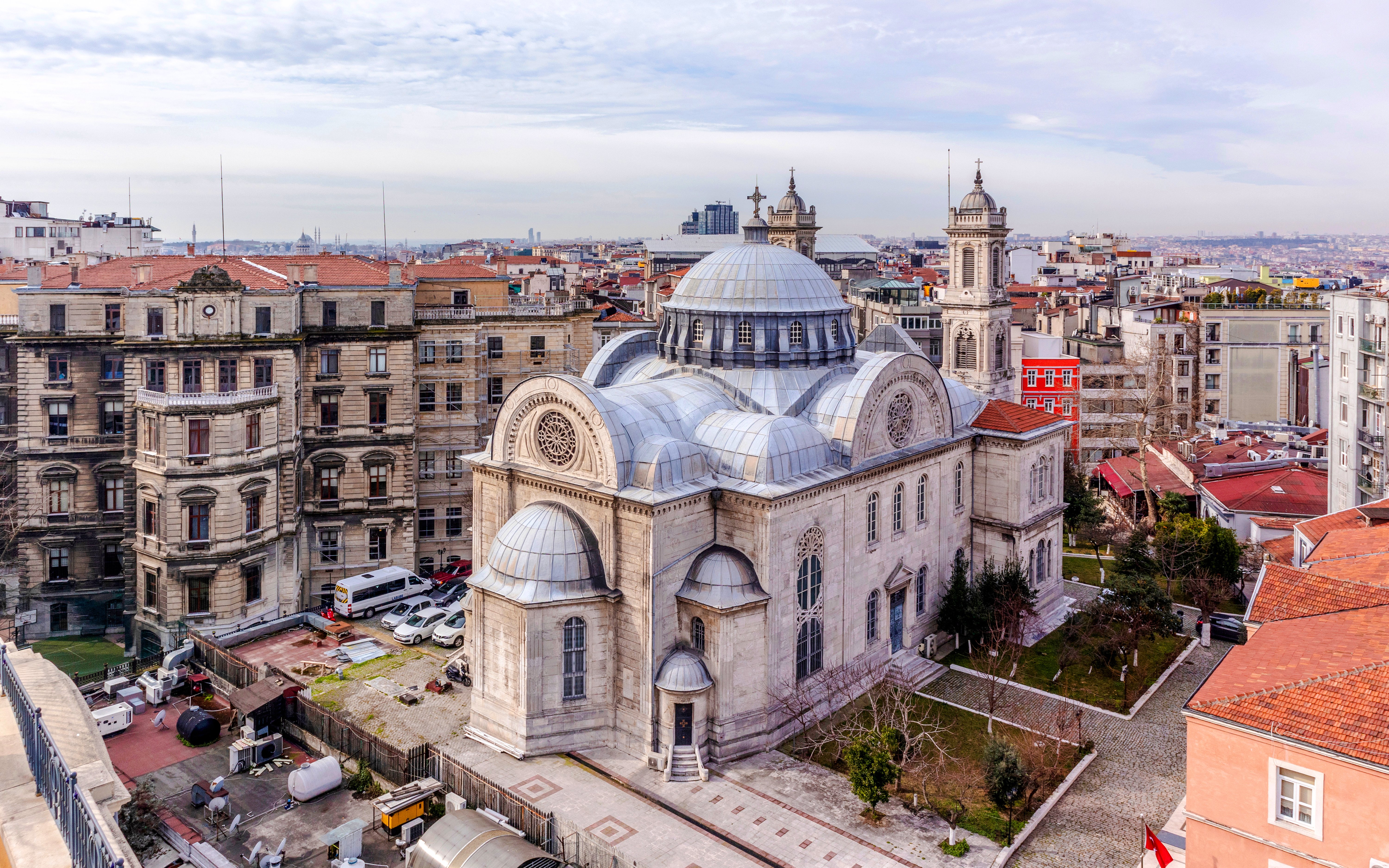 Hagia Triada Church with domes and surrounding buildings in Istanbul, Turkey.