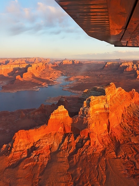 Aerial view of Antelope Canyon and Horseshoe Bend from an airplane during a scenic tour.