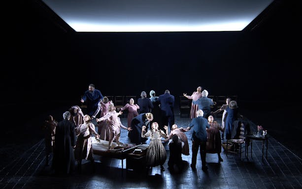 Stage performance of "The Crucible" with actors in period costumes, dramatic scene.