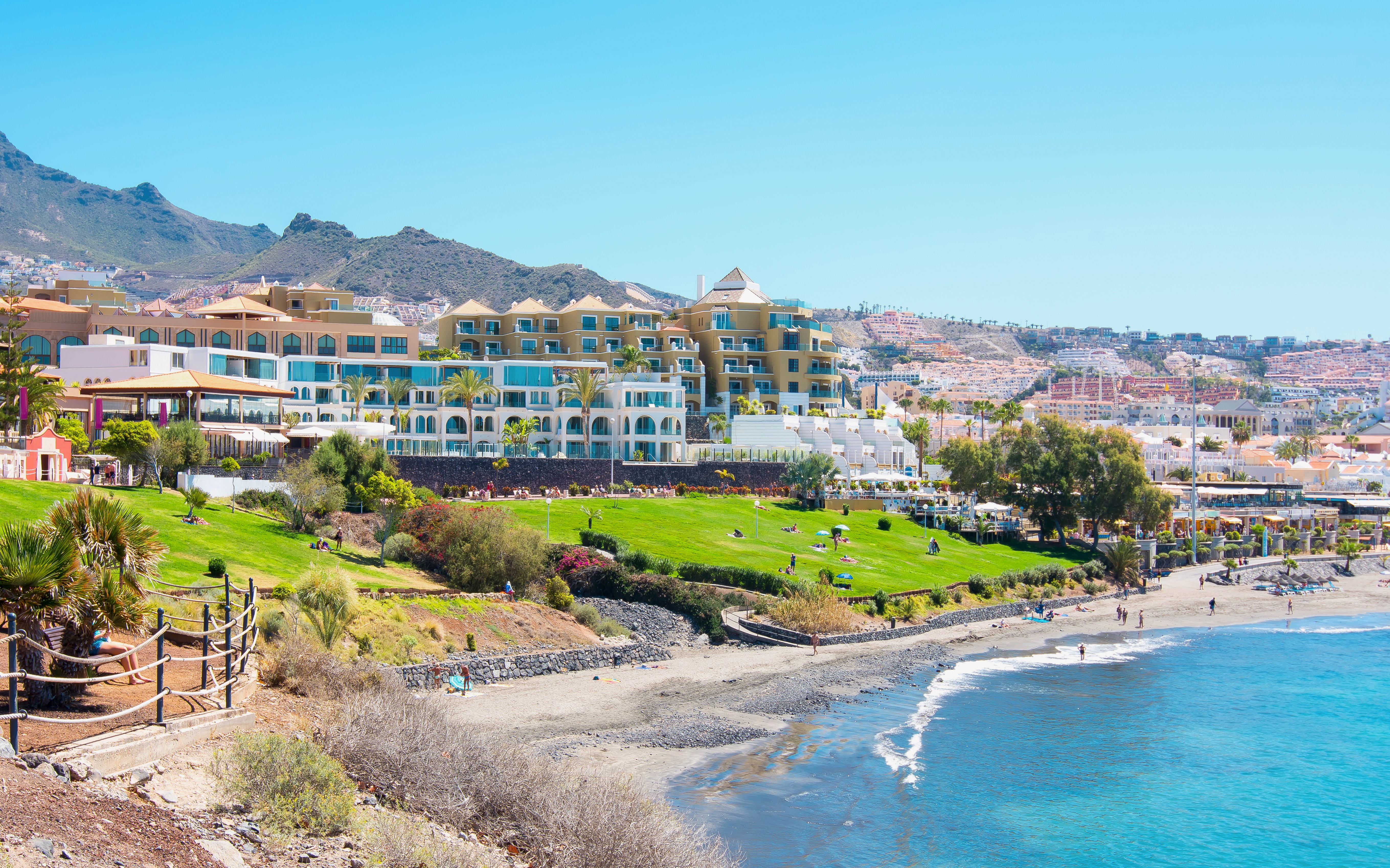 Costa Adeje coastline with beach and resort buildings, Tenerife, Canary Islands, Spain.