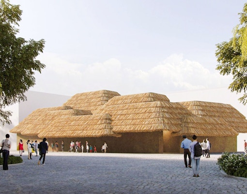 Earth Mart Pavilion with thatched roof at Expo 2025 Osaka, Kansai, surrounded by visitors.