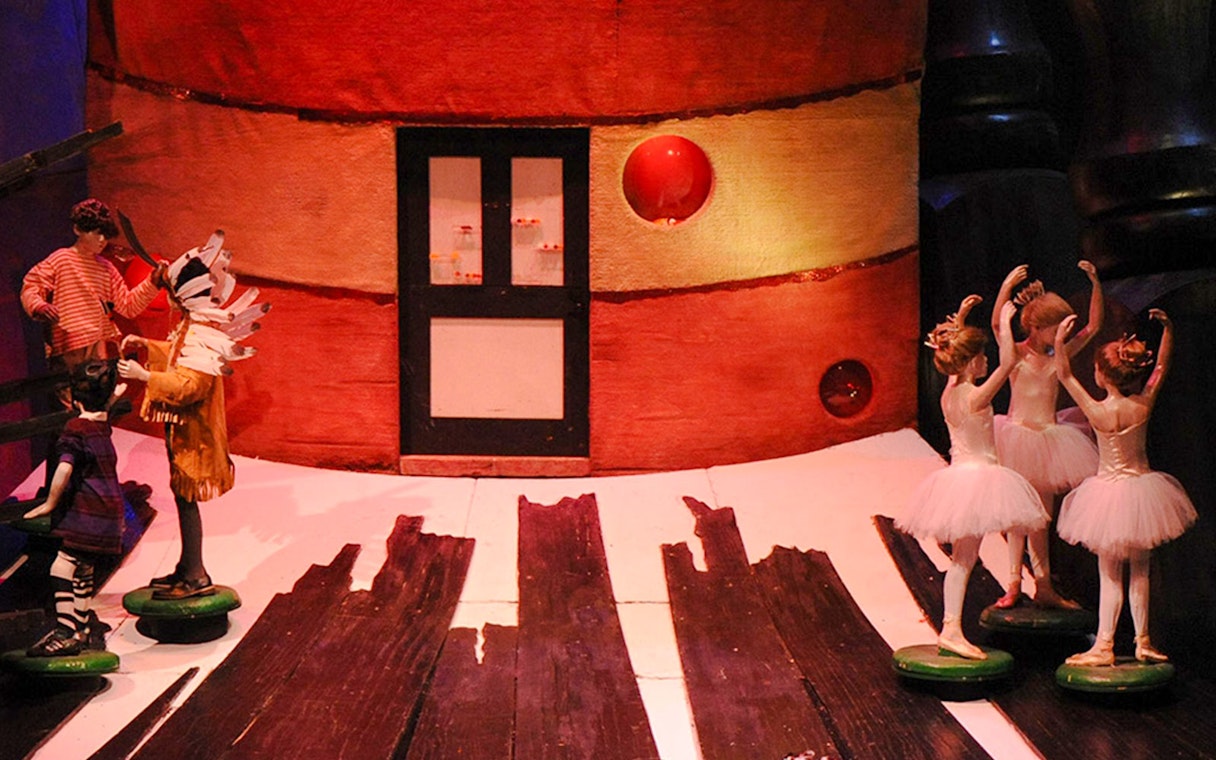 Theatrical scene from Hansel and Gretel performance in Sydney with dancers and set.